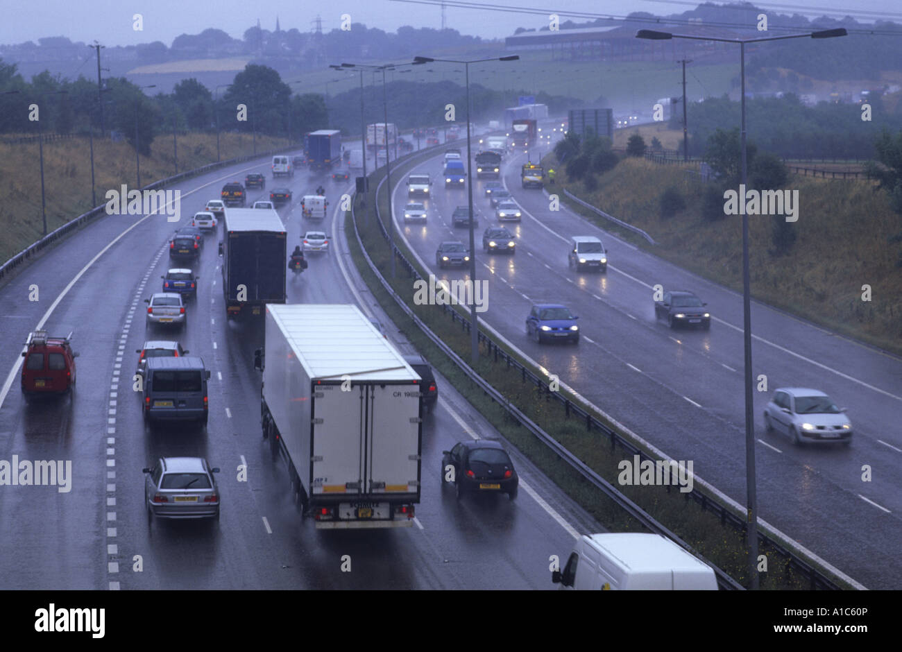 traffic jam on the m62 motorway during heavy rain storm leeds yorkshire uk stock photo alamy