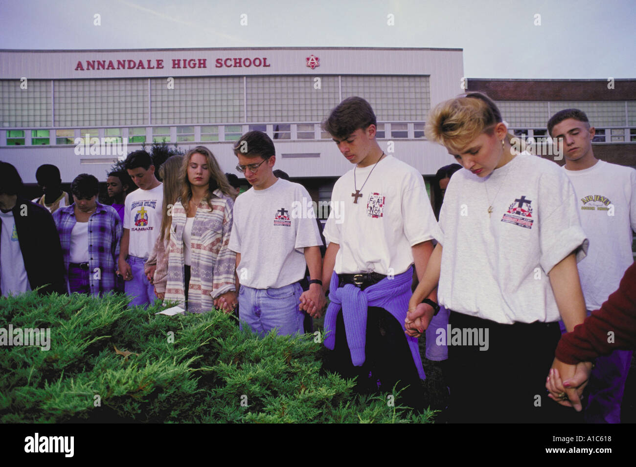 Annandale High School students join hands and pray at school on