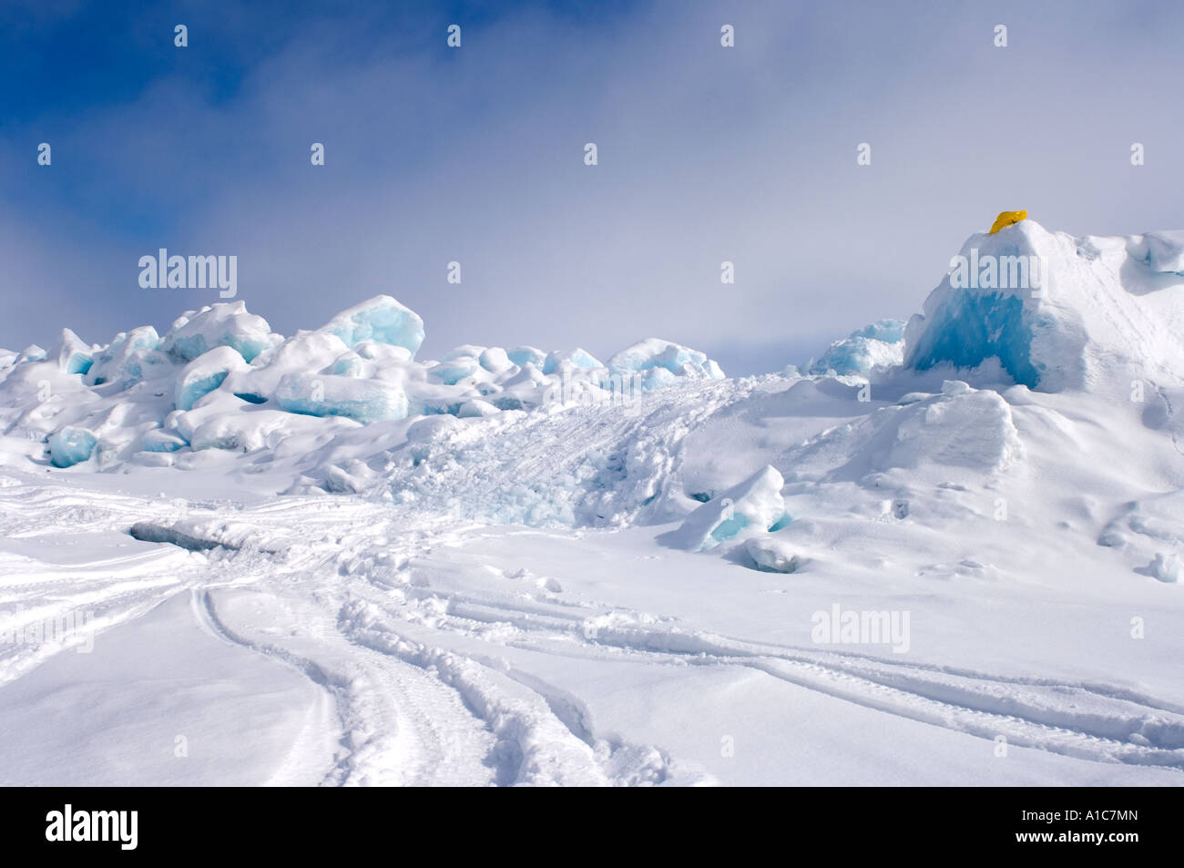 snow machine tracks through jumbled ice in the frozen Chukchi Sea