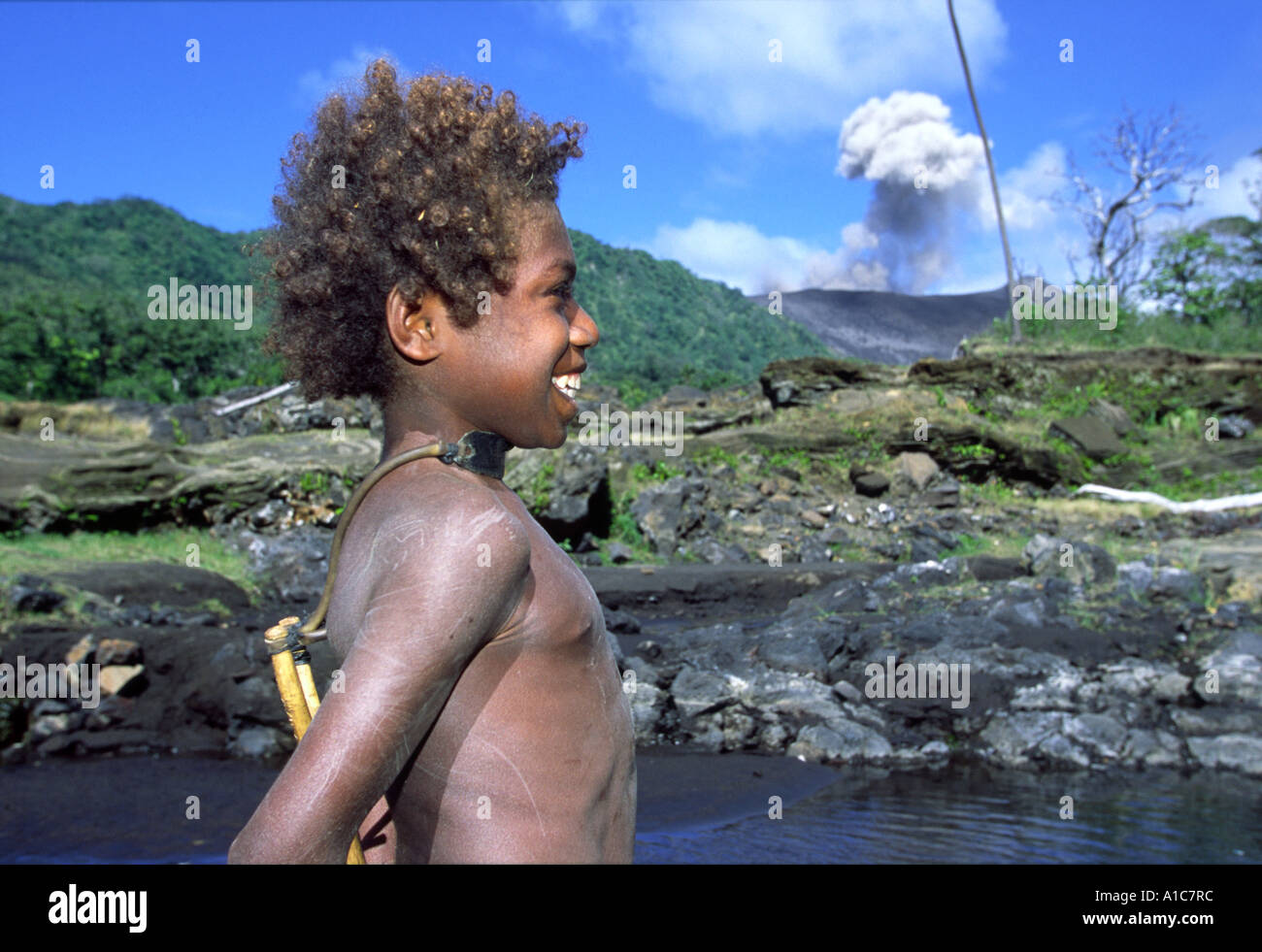 Vanuatan Boy & Volcano Stock Photo