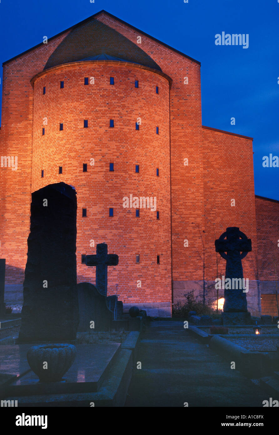 Lundby New Church and cemetery in soft quiet light on All Saints' Day. (2006) Gothenburg, Sweden