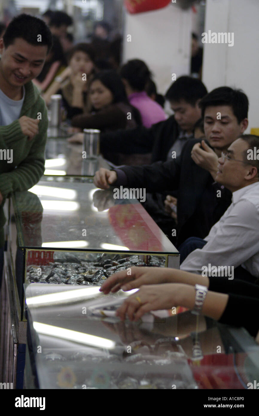 Dealers and customers in Wangjiao Horological Market Guangzhou, China for fake watches Stock
