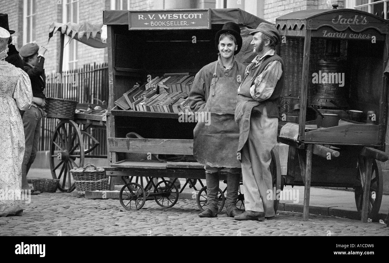 Extras with book barrow and in period costume to appear in TV production of Oliver Twist. Stock Photo