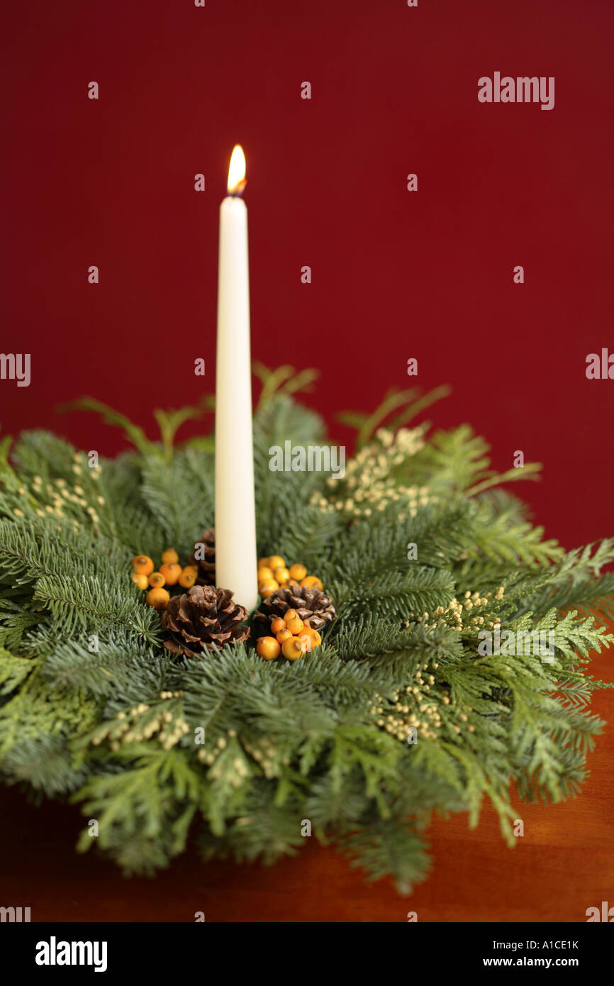 Holiday Centerpiece with Candle Stock Photo