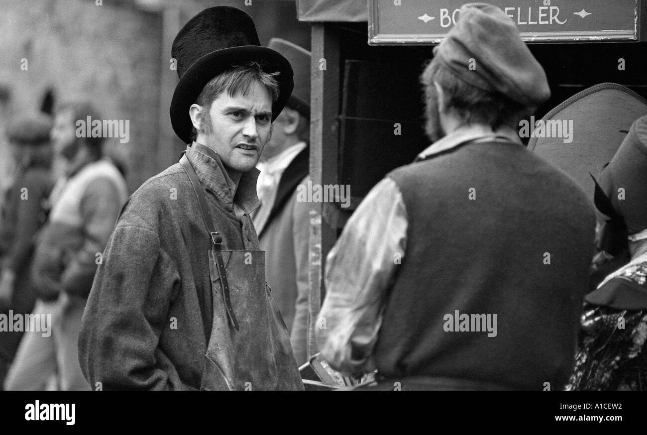Man in period costume to appear in TV production of Oliver Twist. Stock Photo