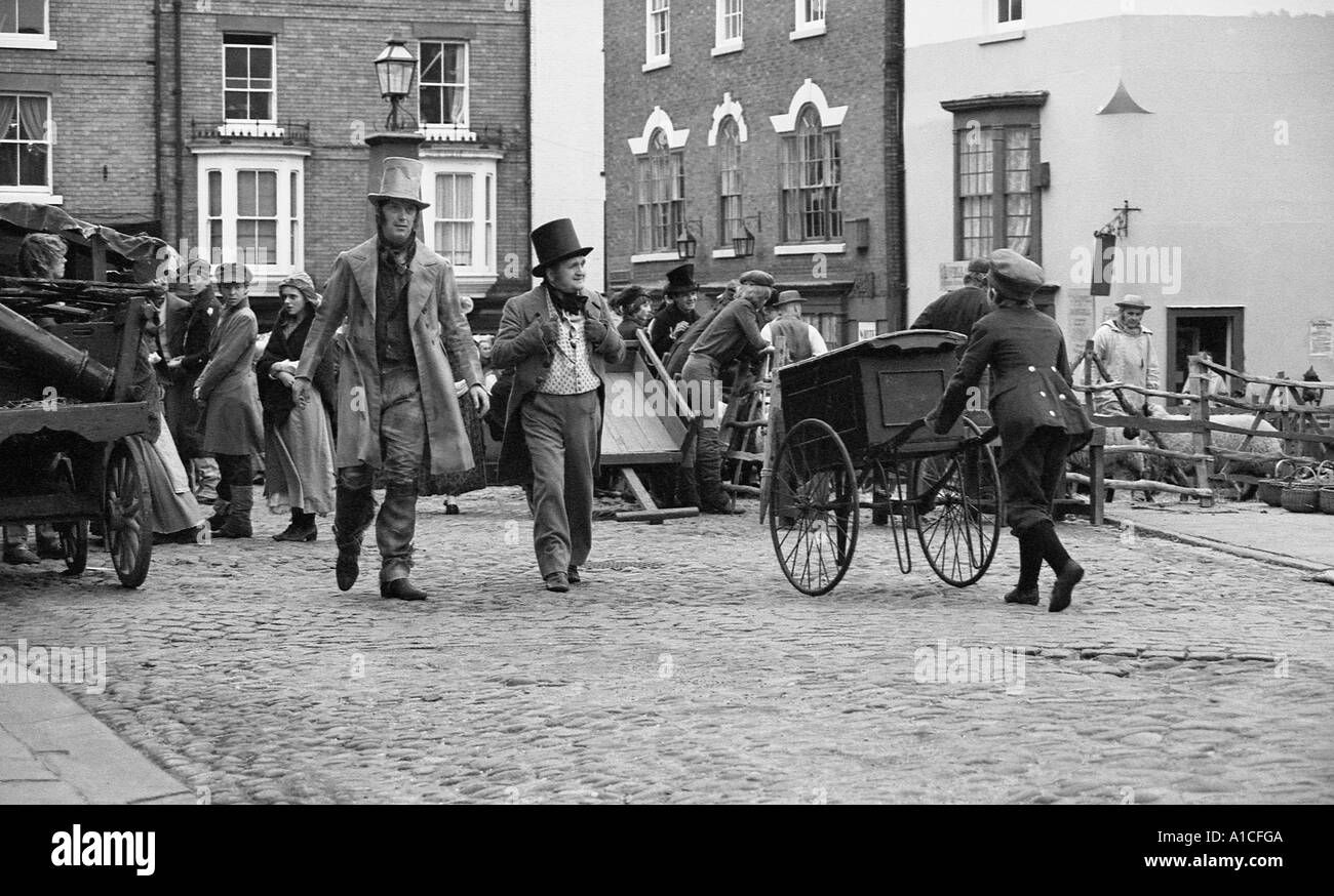 People in period costume to appear in TV production of Oliver Twist. Stock Photo