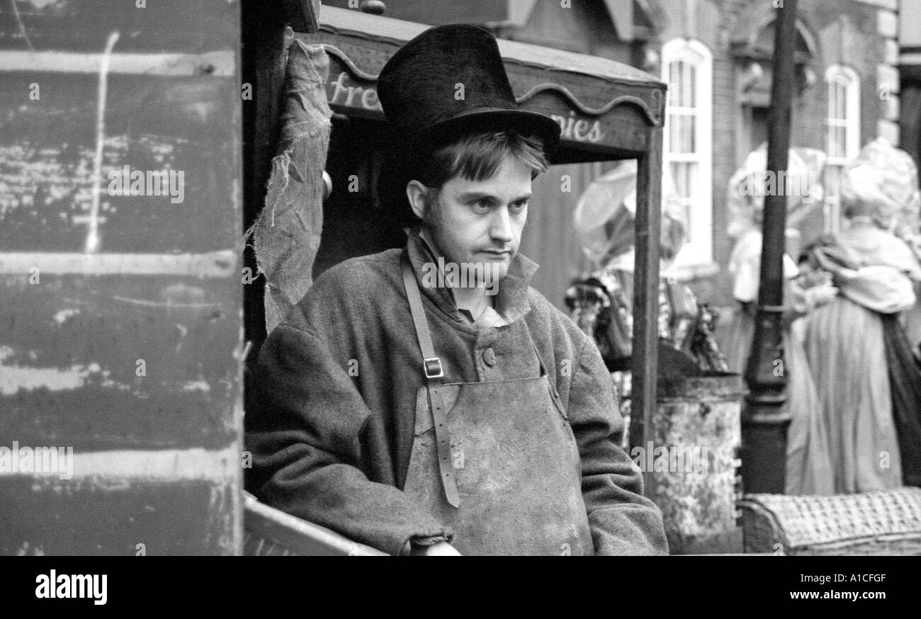 Man in period costume to appear in TV production of Oliver Twist. Stock Photo