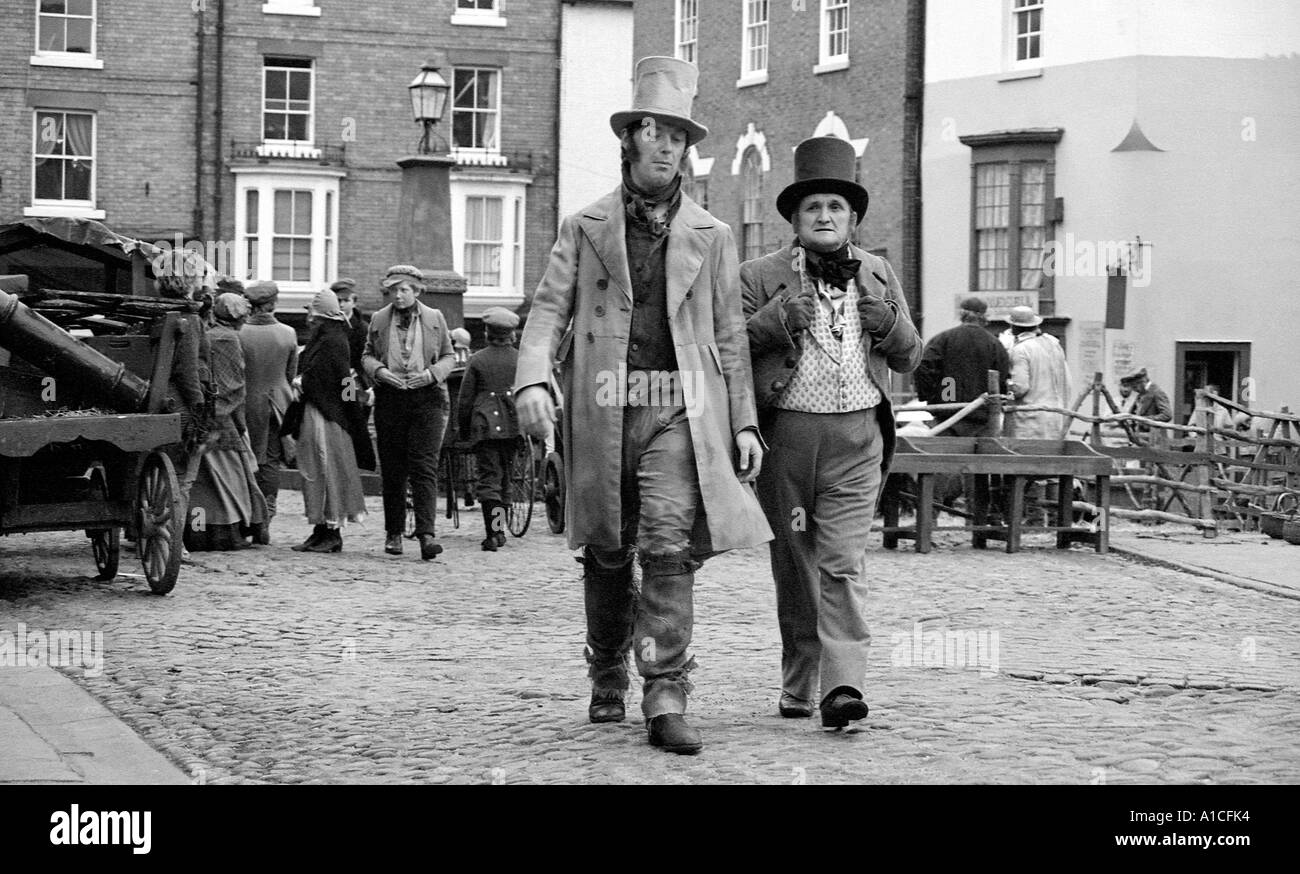Two men in period costume to appear in TV production of Oliver Twist. Stock Photo