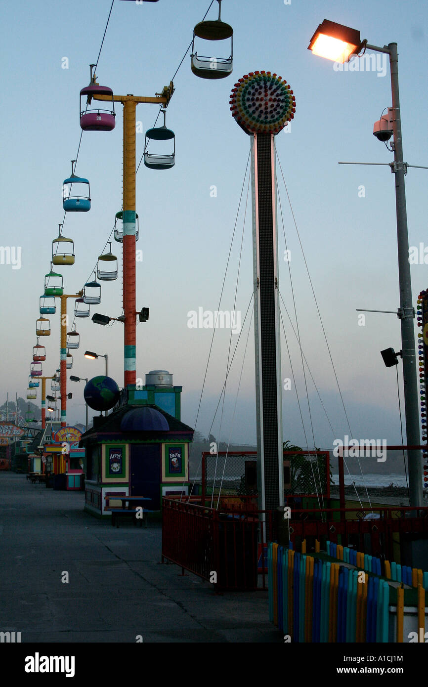 Santa Cruz Beach Boardwalk amusement park at sundown, out of season Stock Photo