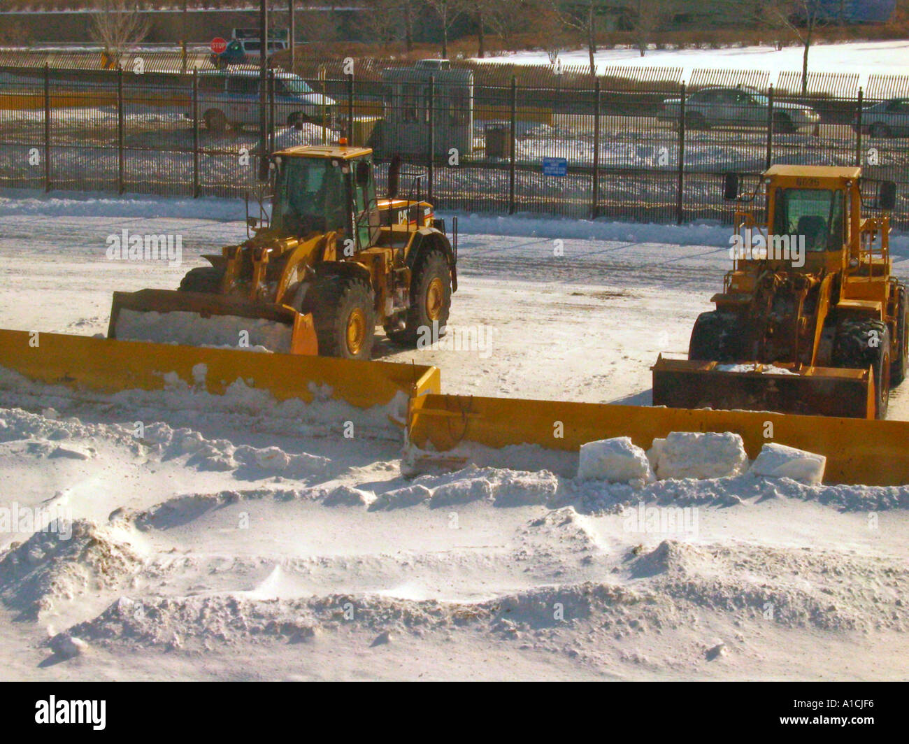 Snow ploughs stand by at OHare Field airport Chicago Illinois USA Stock Photo Alamy