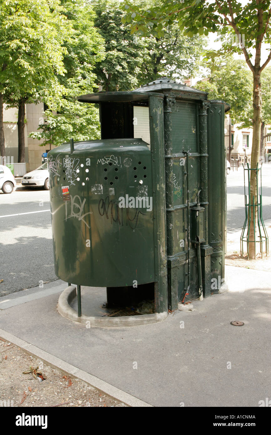 Traditional original pissoir public toilet in the street in Paris France Stock Photo