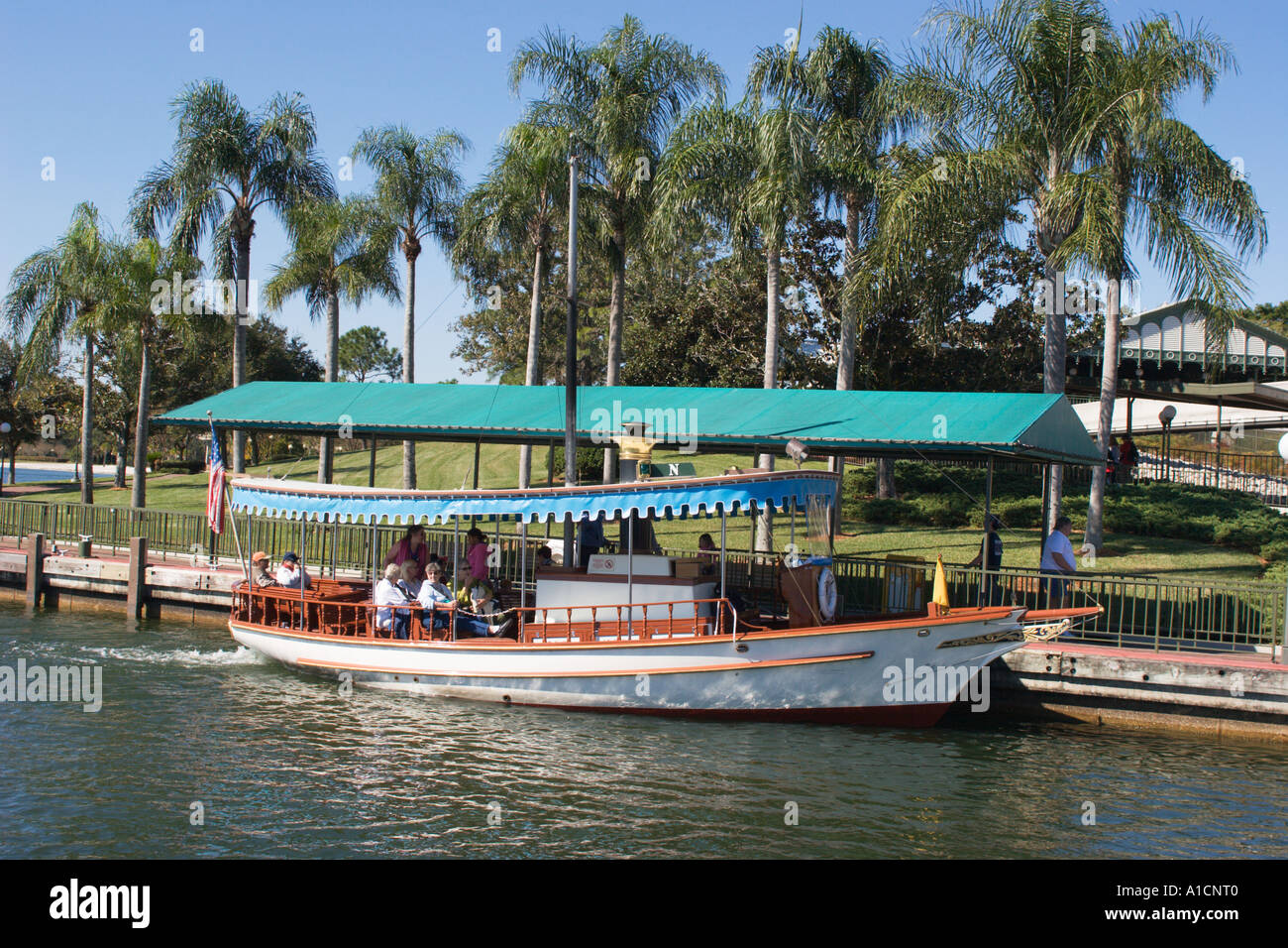Passengers boarding boat at Transportation Center at Disney World in