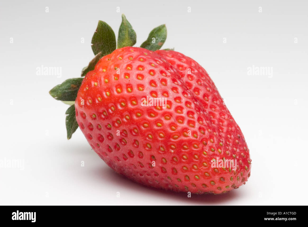 Fresh organic strawberry against white background Stock Photo - Alamy