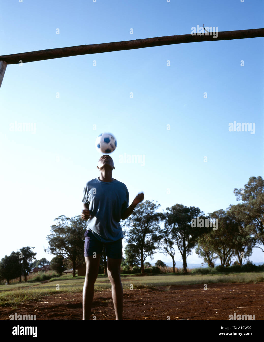 African boy playing football Stock Photo