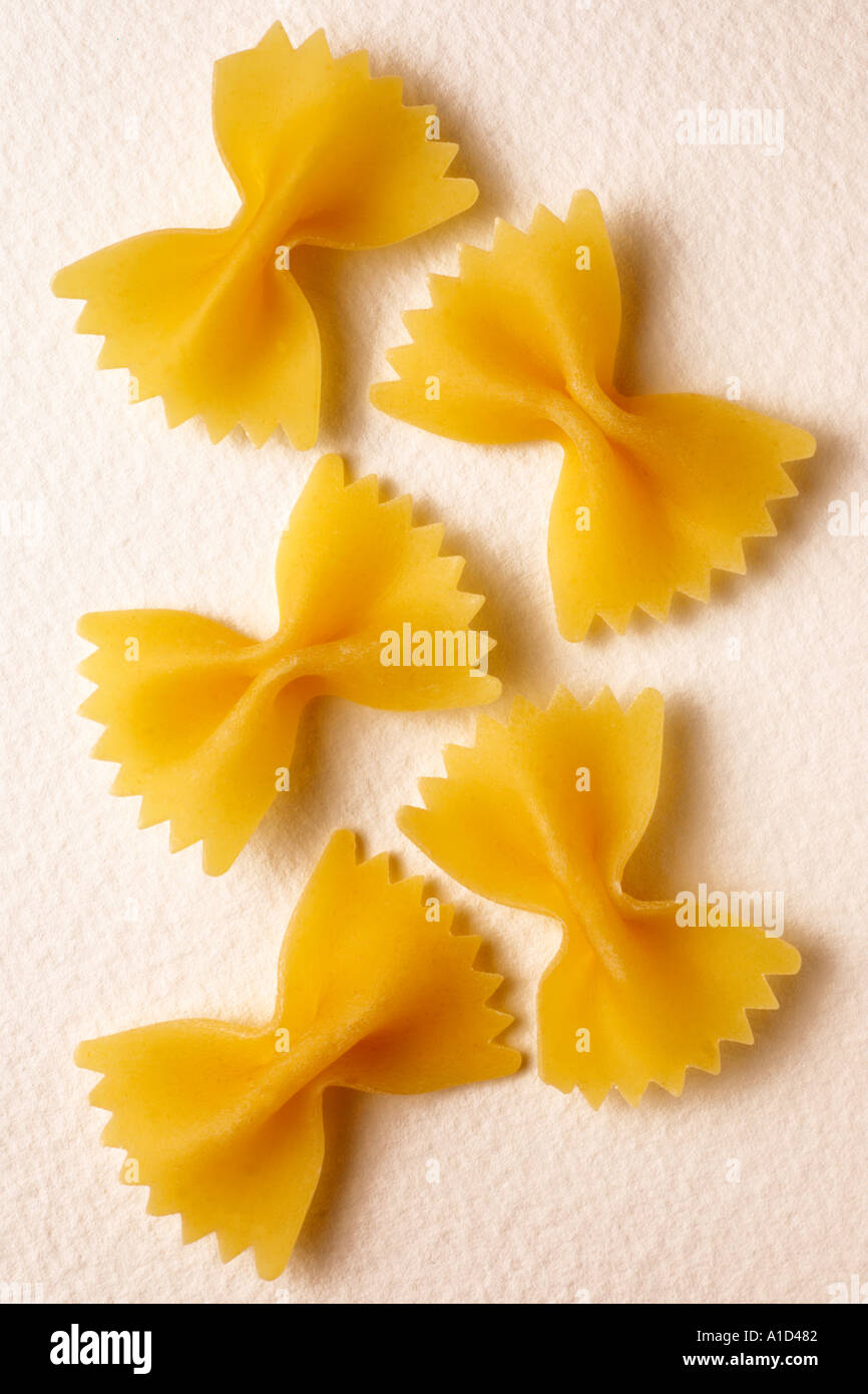 FARFALLE PASTA ON WHITE Stock Photo