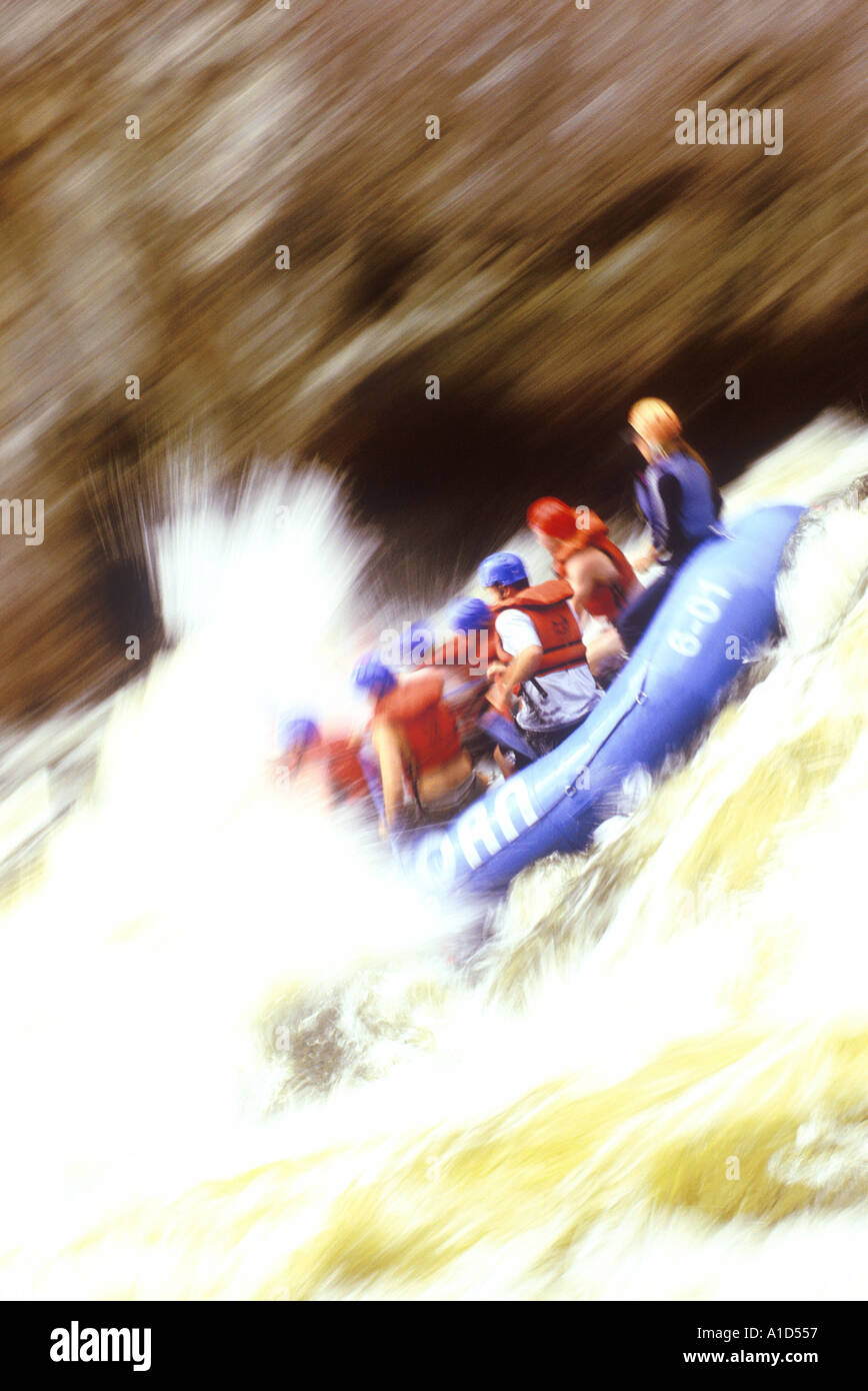 Special effect to show speed of group in raft tacking the rapids on a fast and dangerous stretch of water Stock Photo