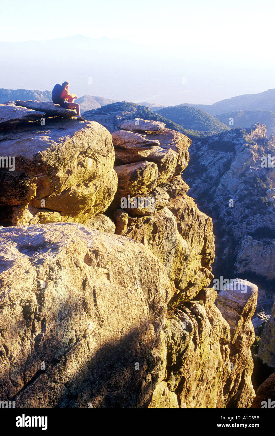 Emma Williams sitting on the top of Mount Lemmon Arizona USA Stock Photo
