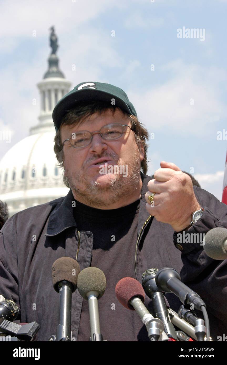 Filmmaker Michael Moore speaks during a news conference on Capitol Hill in Washington. Stock Photo