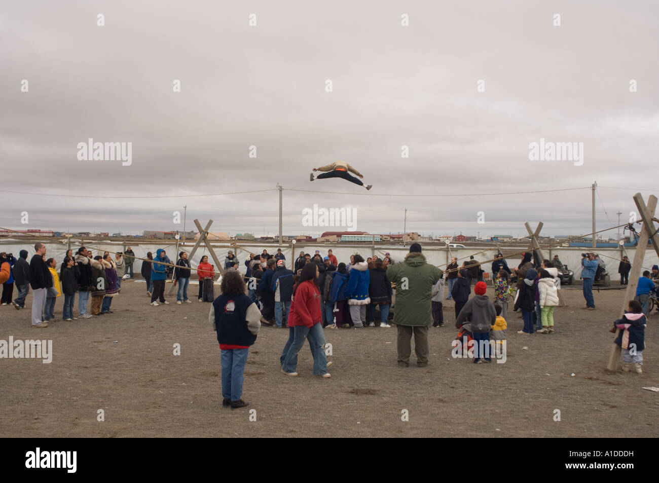 blanket toss at the spring Nilugatuk event celebrating the end of a