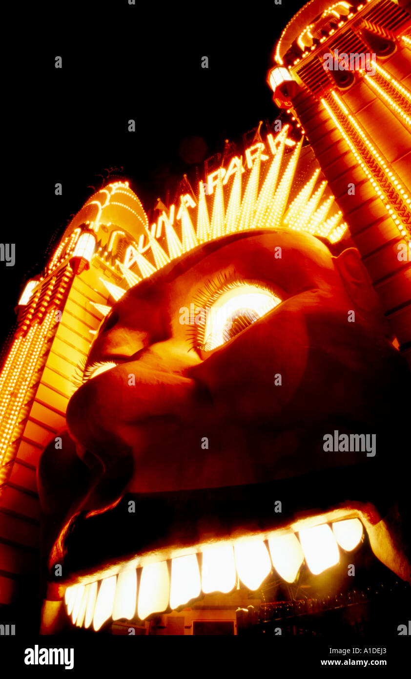 The iconic face of Luna Park on Sydney Harbour lit up at night. Stock Photo