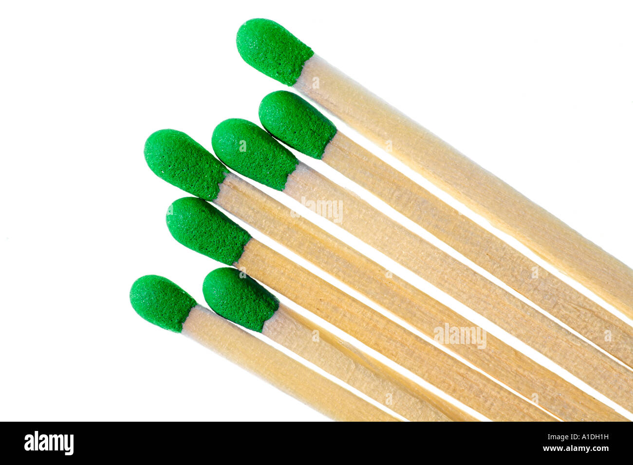 Matches with green match heads on white background Stock Photo