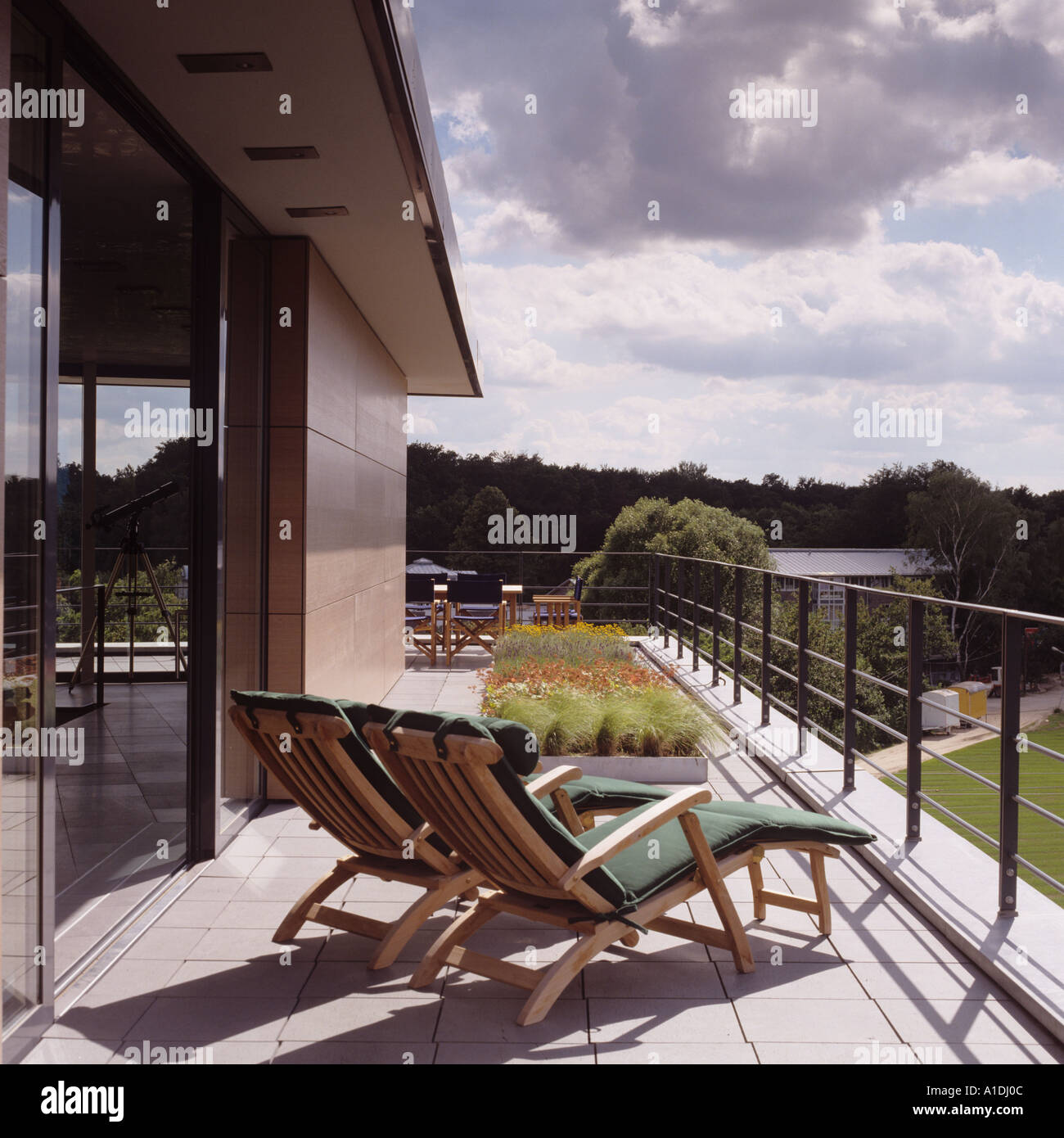 Sun loungers on balcony of of modern building Stock Photo - Alamy