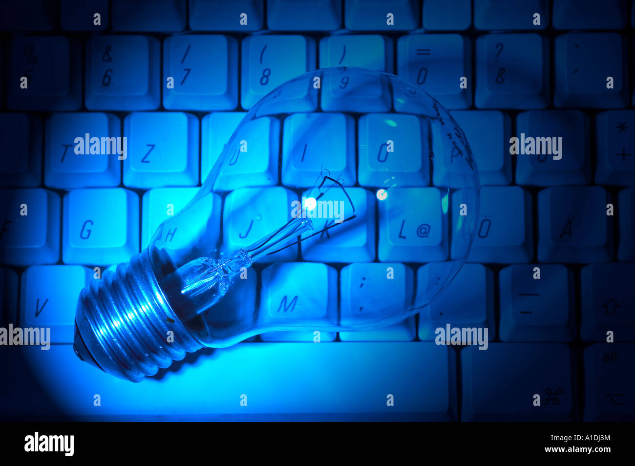 Light bulb on a keyboard (idea) Stock Photo