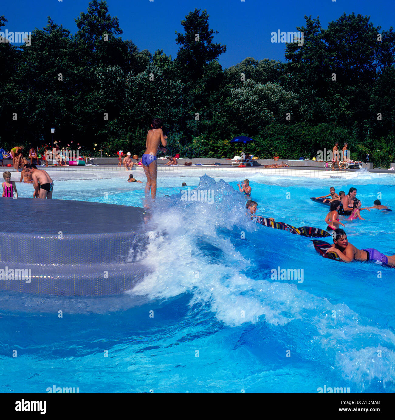 public swimming pool Bavaria Germany people swim waves fun. Photo by