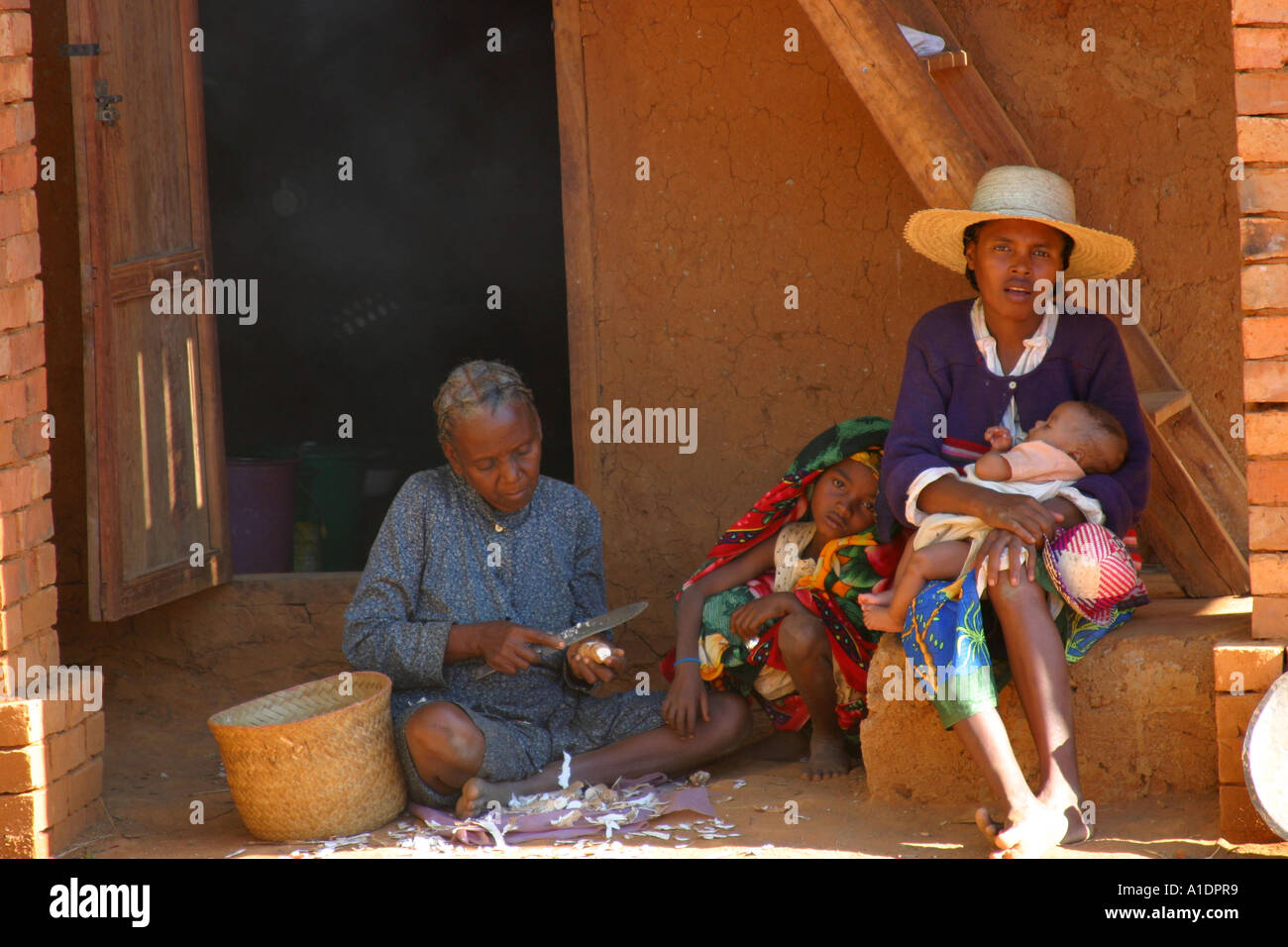 Family scene in the shade Stock Photo - Alamy