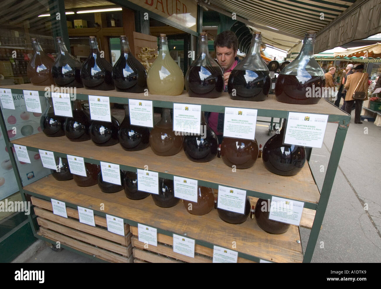 Austria Vienna Naschmarkt glass flasks of vinegar Stock Photo