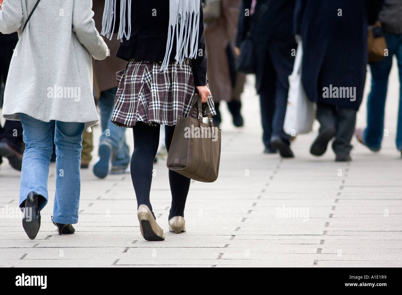 Commuters walking fast in London England United Kingdom Stock Photo