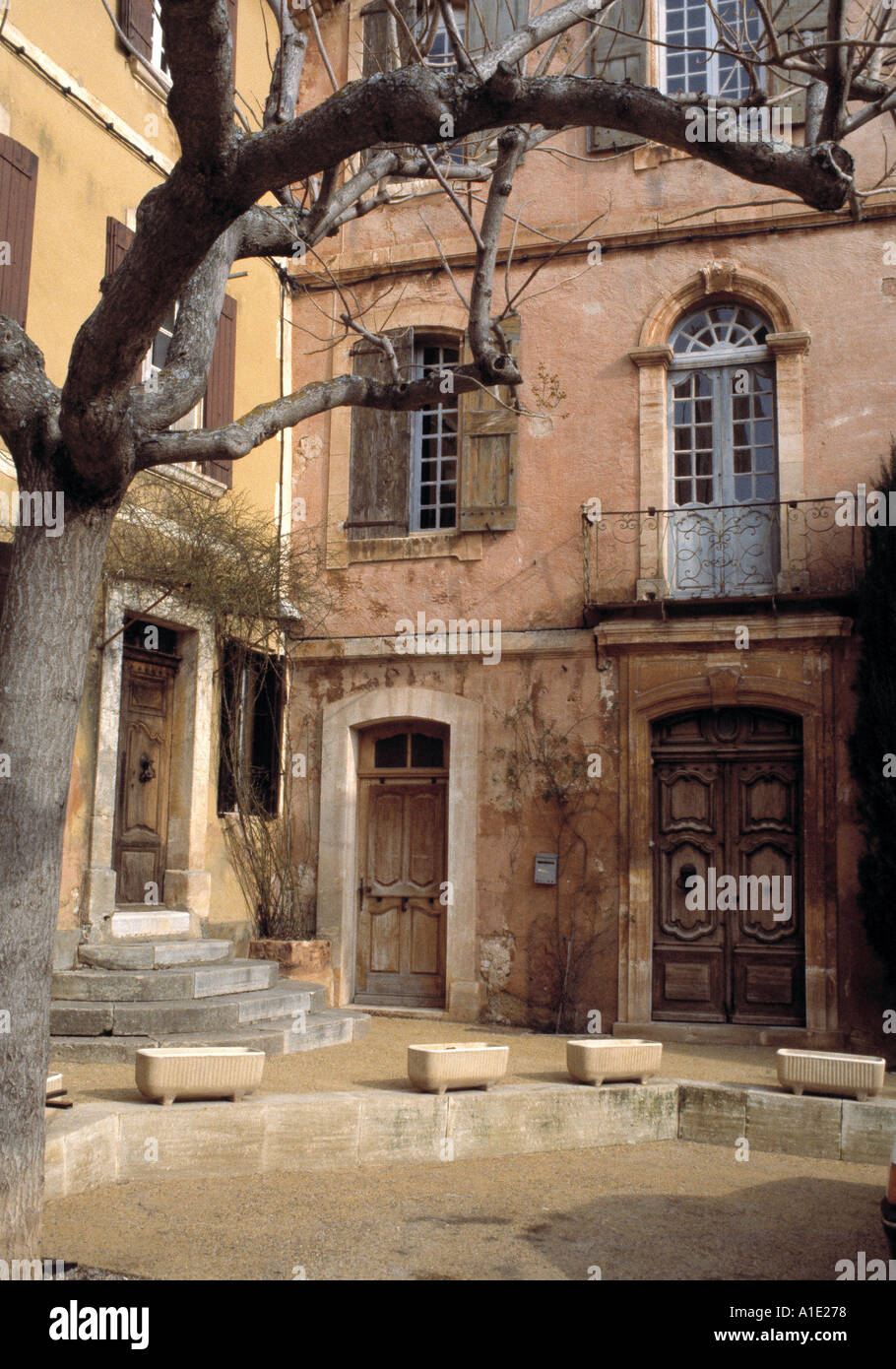 Houses in the village of Rousillon are decorated with paint tinted with pigments from the earth of the area Stock Photo
