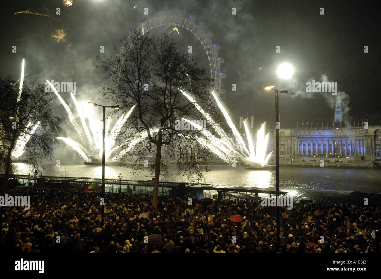 london new years eve firework display river thames westminster london eye  southbank crowd colour color travel tourism lights cel Stock Photo - Alamy