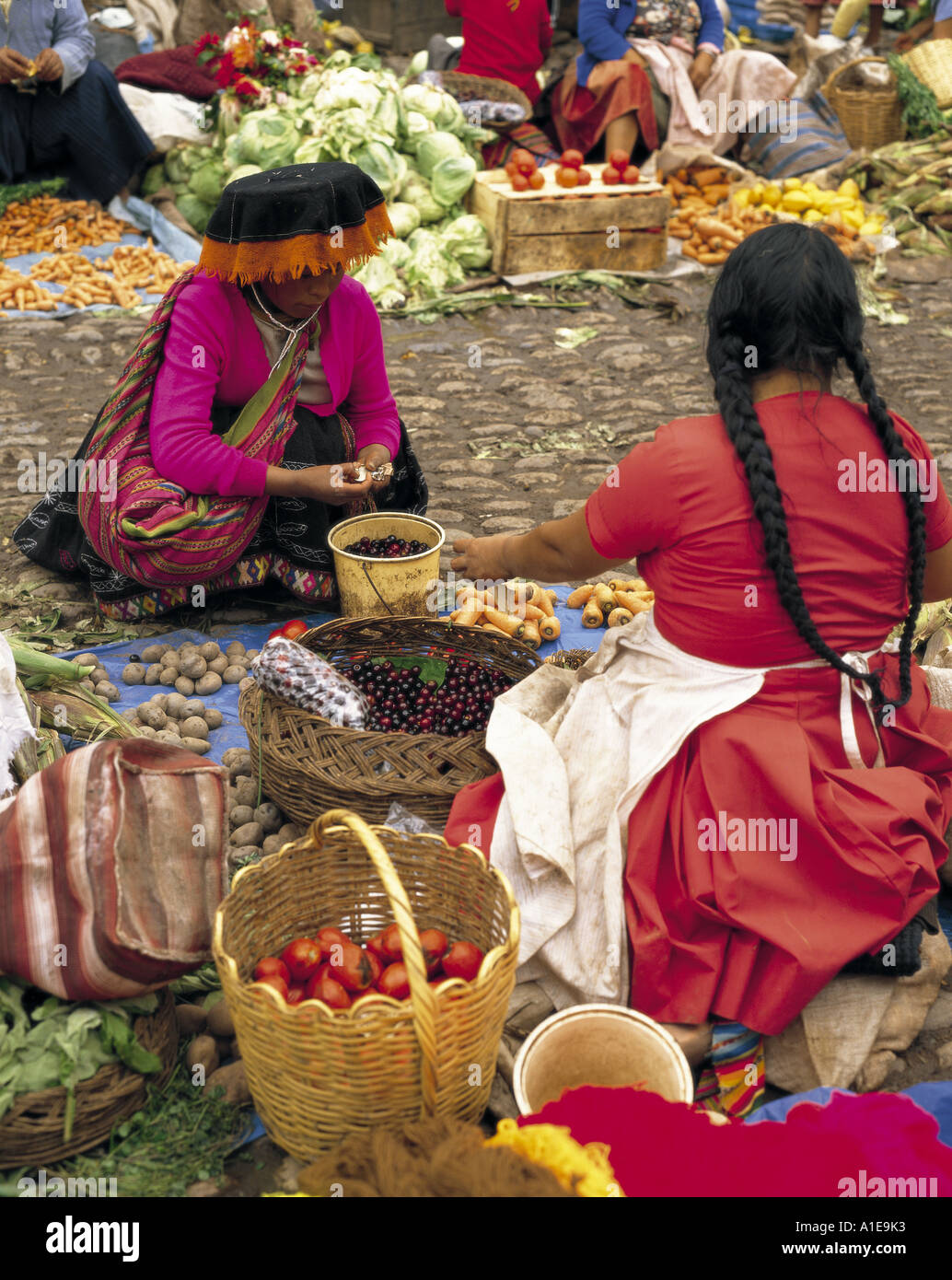 Local villagers in traditional dress at Pisac market in Peru, South America Stock Photo