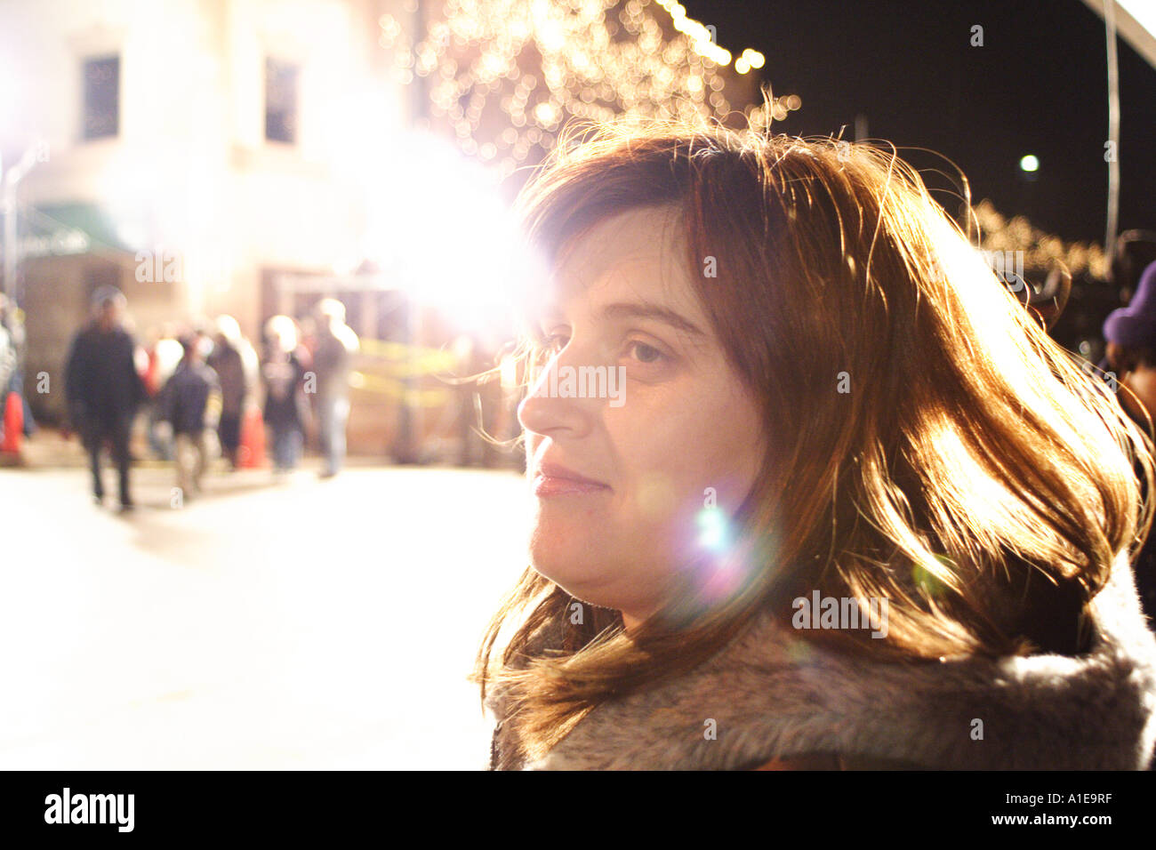 Young woman waiting for the parade to start Stock Photo