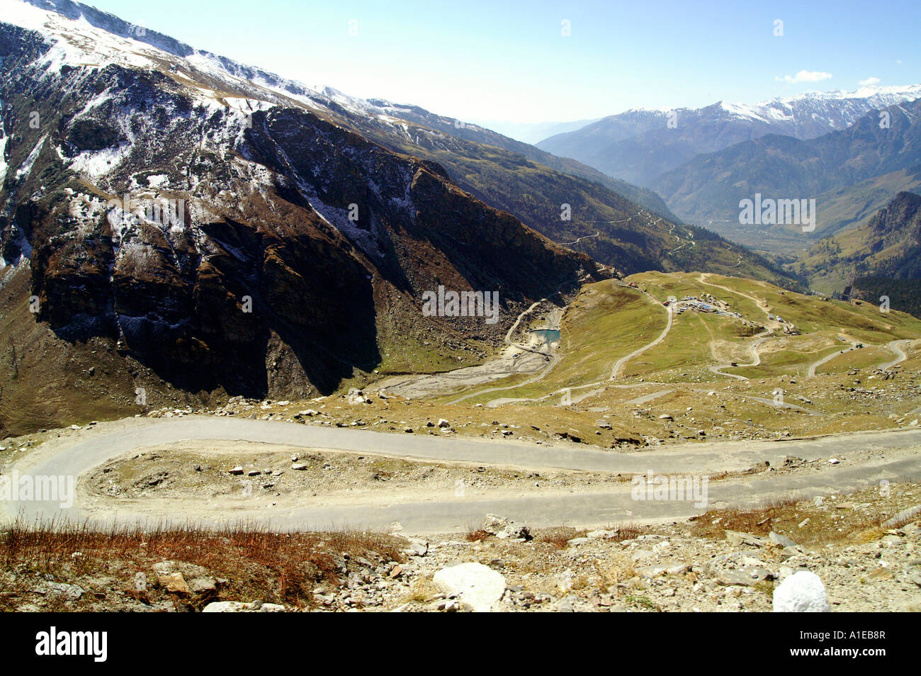 Meander road towards Rohtang pass at the end of Kullu Valley, Indian Himalaya mountains Stock Photo