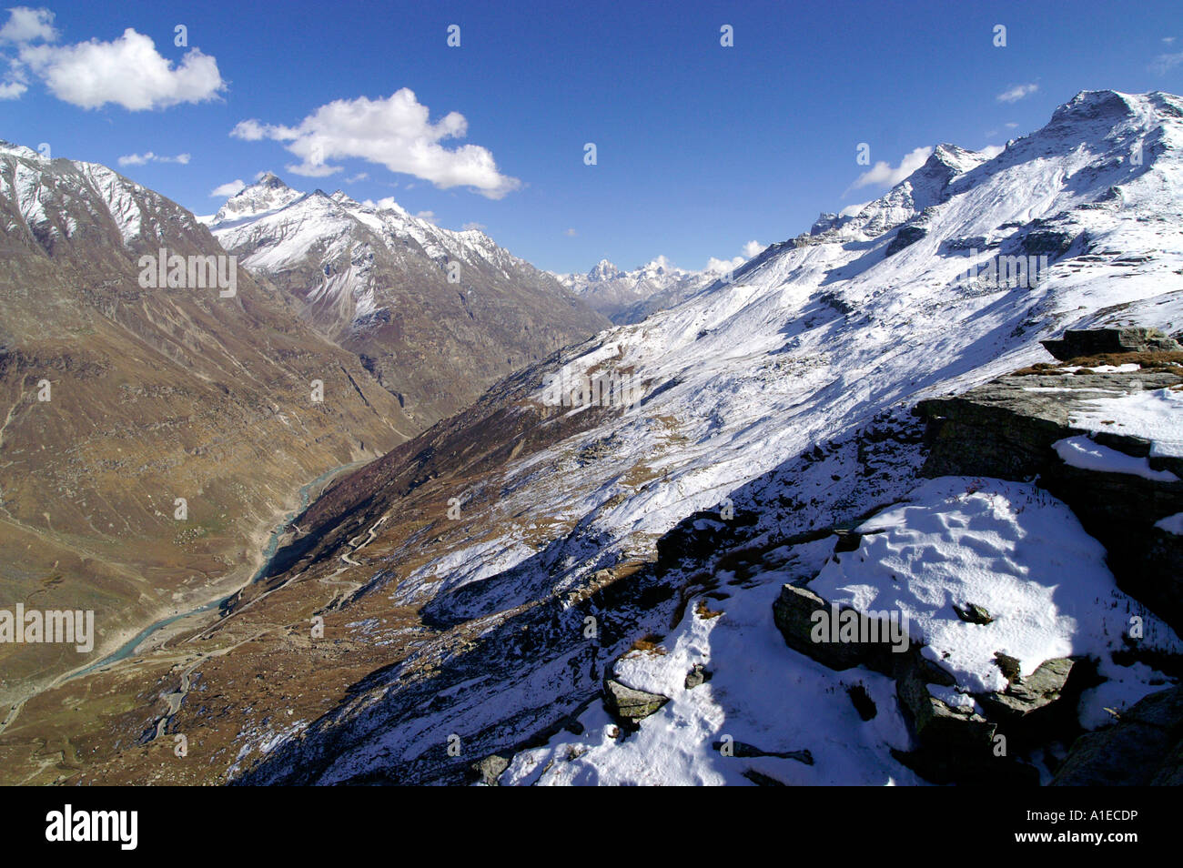 Snow covered peaks of Indian Himalaya Lahaul district above Lahaul Valley from Rohtang Pass Stock Photo