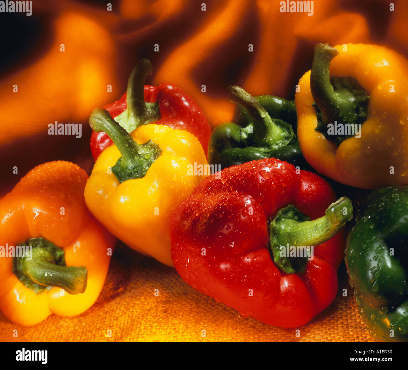 Selection of red yellow and green peppers Stock Photo