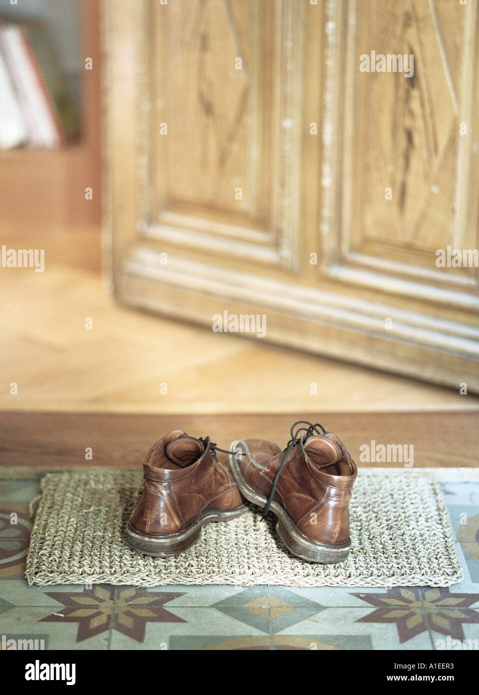 Shoes on doormat Stock Photo