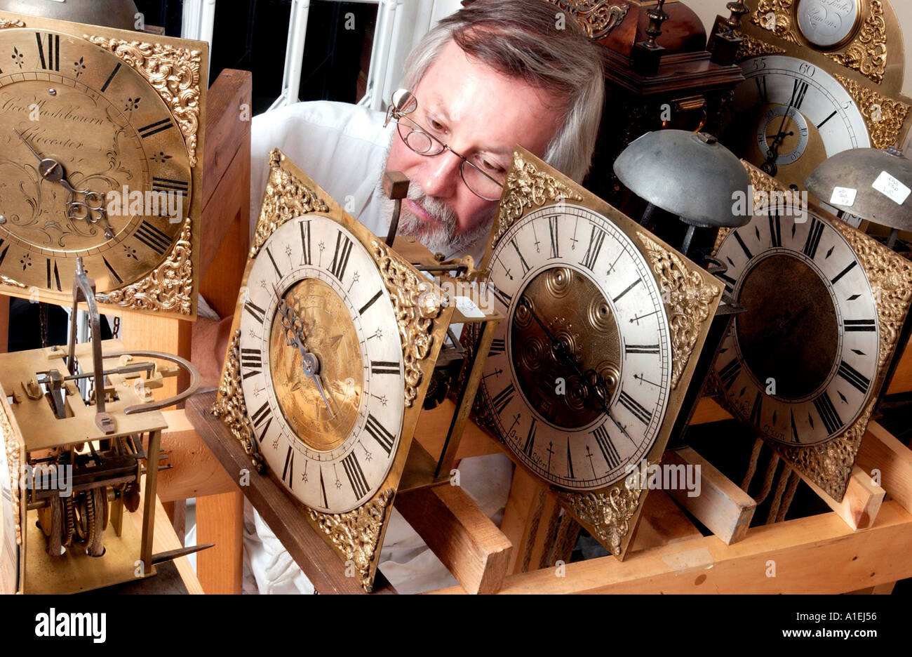 Time for study Mature student on antique clock renovation course Stock ...