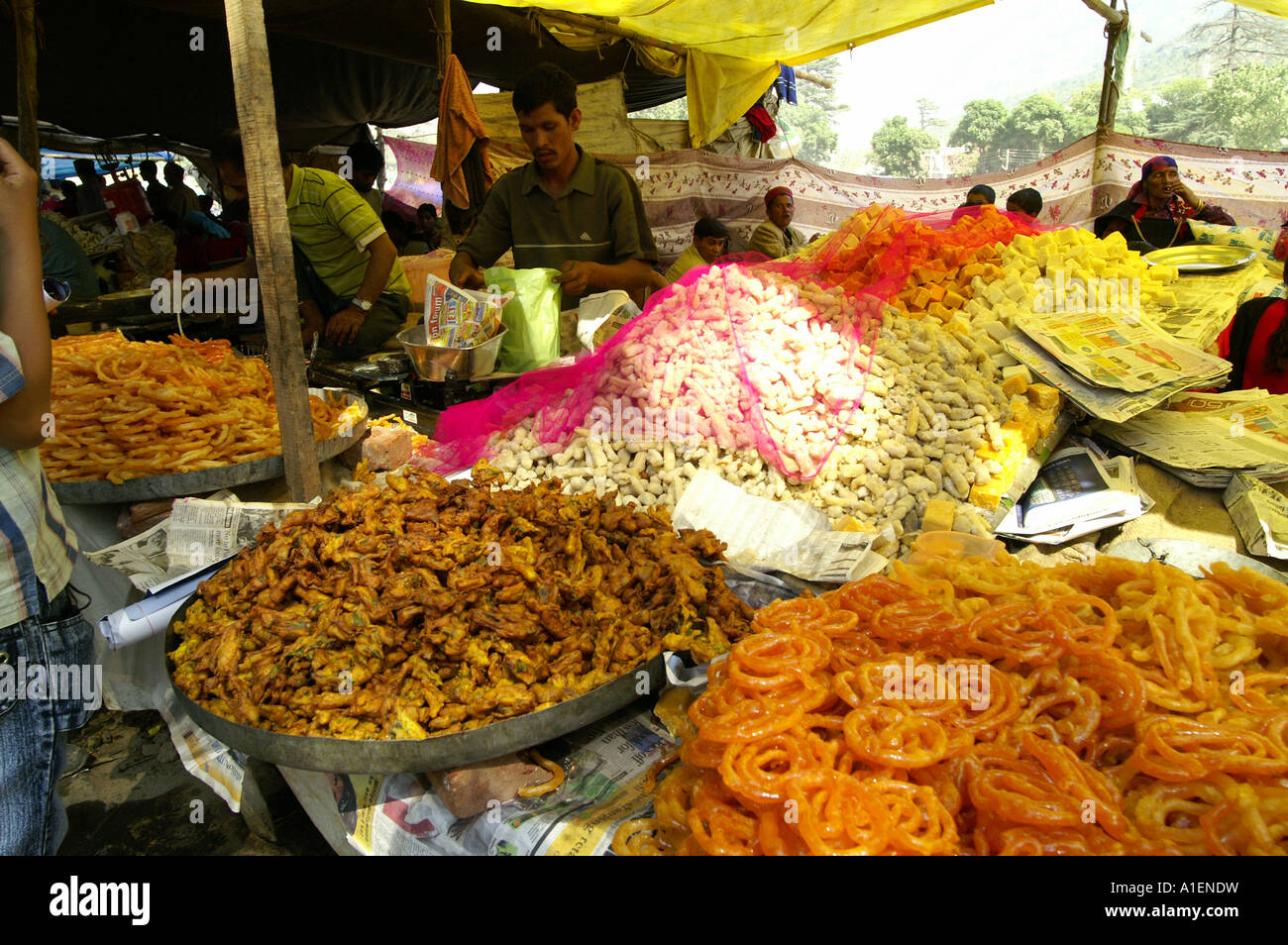 Heaps of food in stalls at Dussehra fair with enormous variety of rich