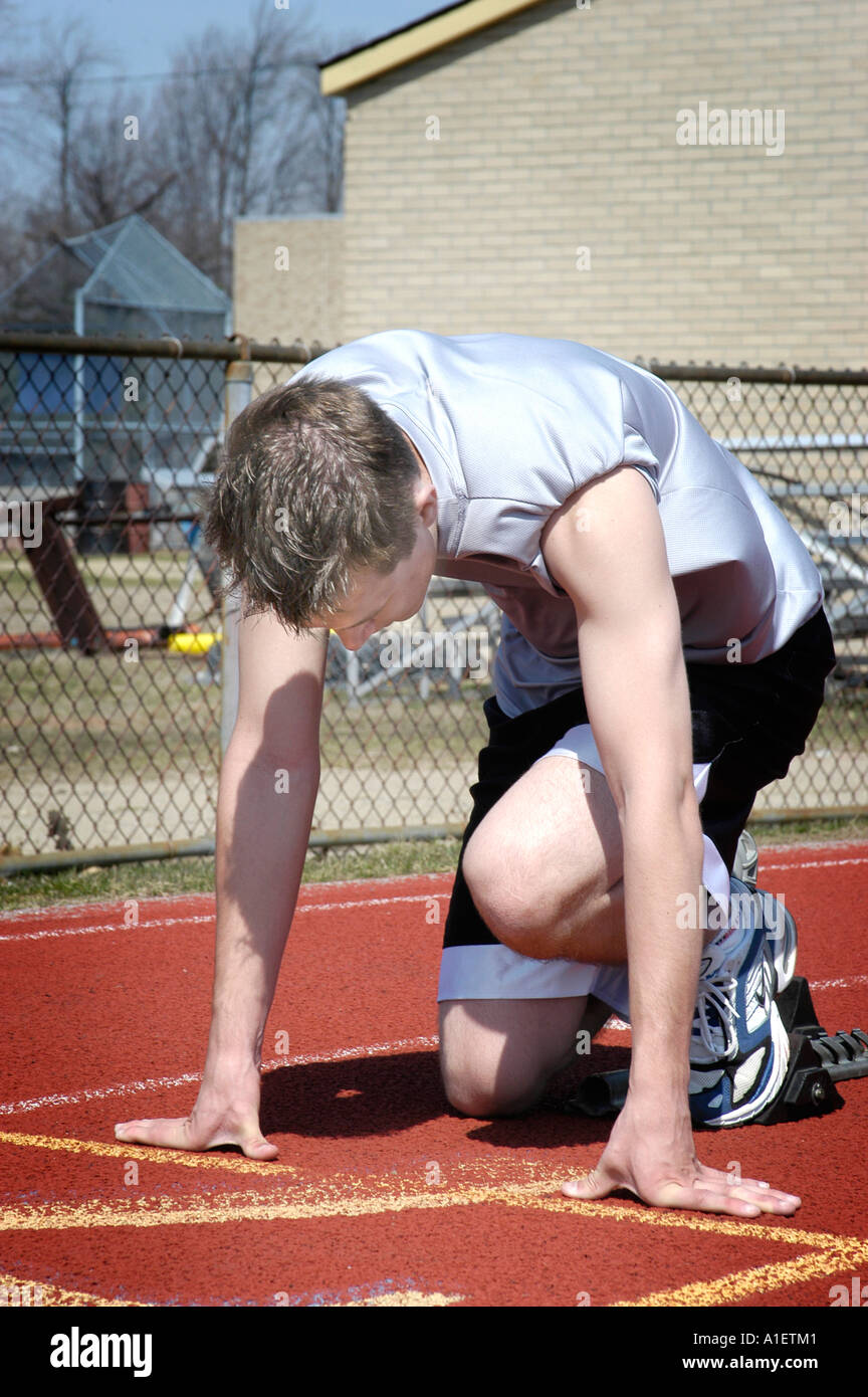 The starting line at the 100 meter dash at a track and field meet Stock