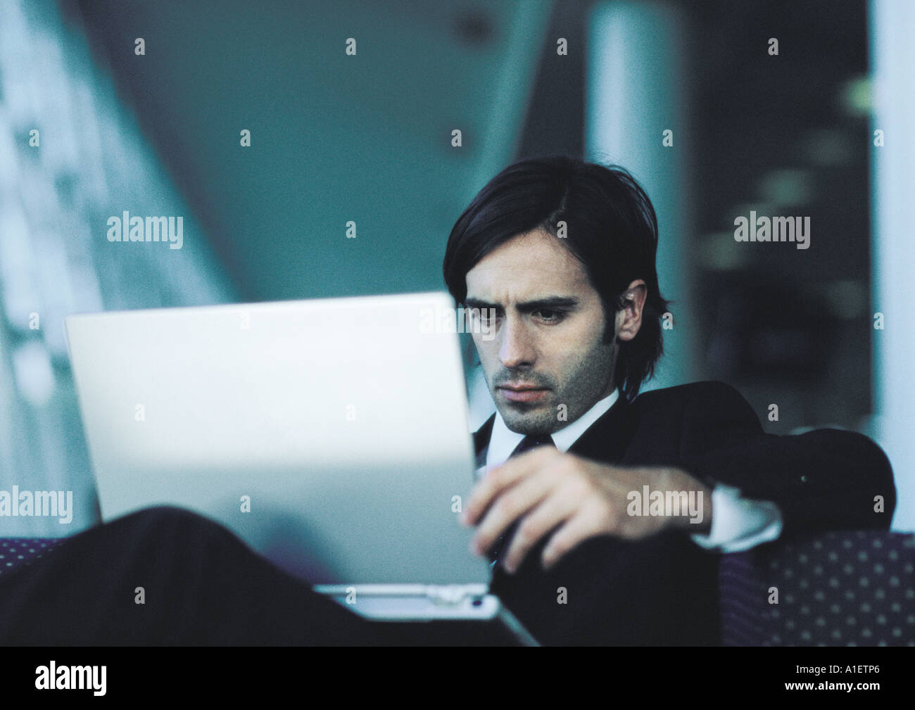 Businessman using laptop Stock Photo