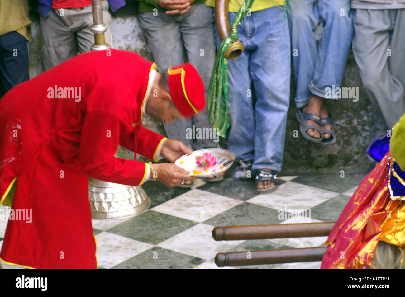 Hinduistic priest performing mysterious rituals at temple yard at ...