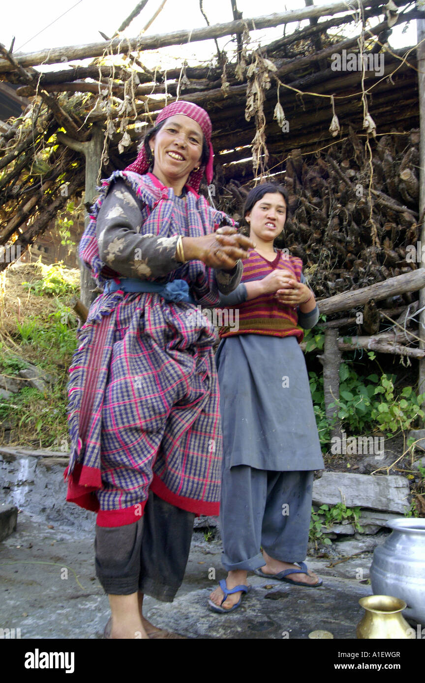 Mother and daughter happy living smiling in Rumsu village, Kullu Valley ...