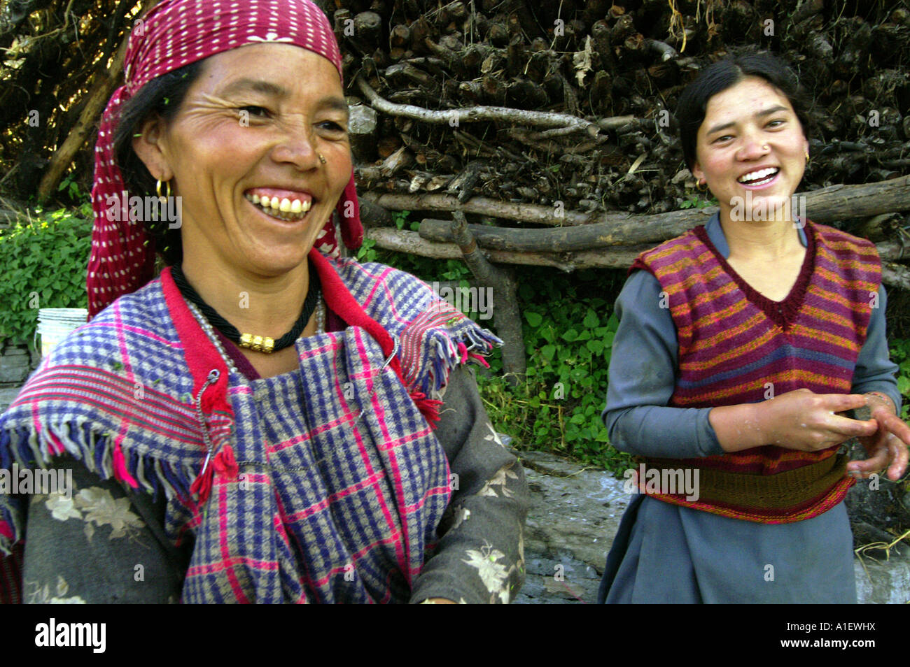 Mother and daughter happy living smiling in Rumsu village, Kullu Valley ...