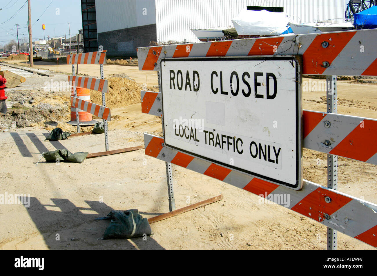 Heavy equipment and manual labor us used in road repair and new street construction Stock Photo