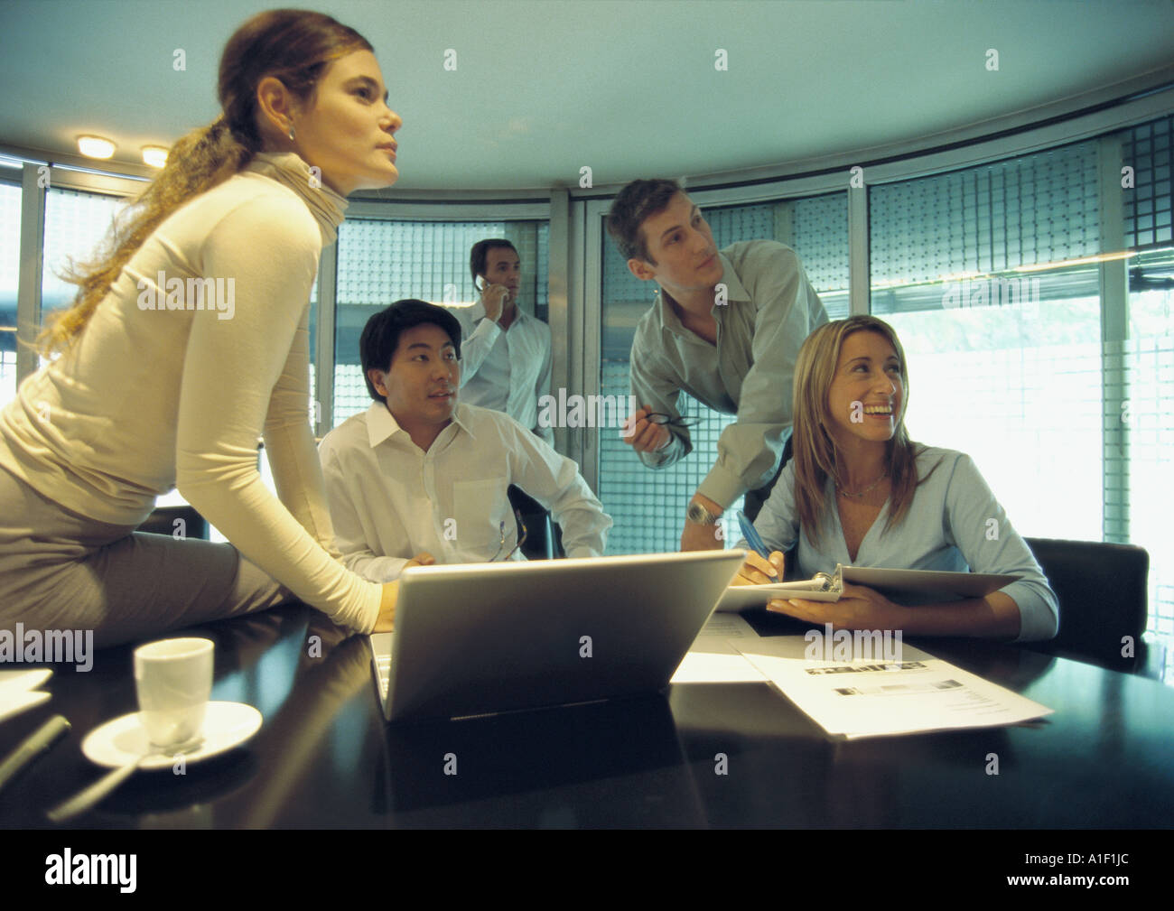 Businesspeople in conference room Stock Photo