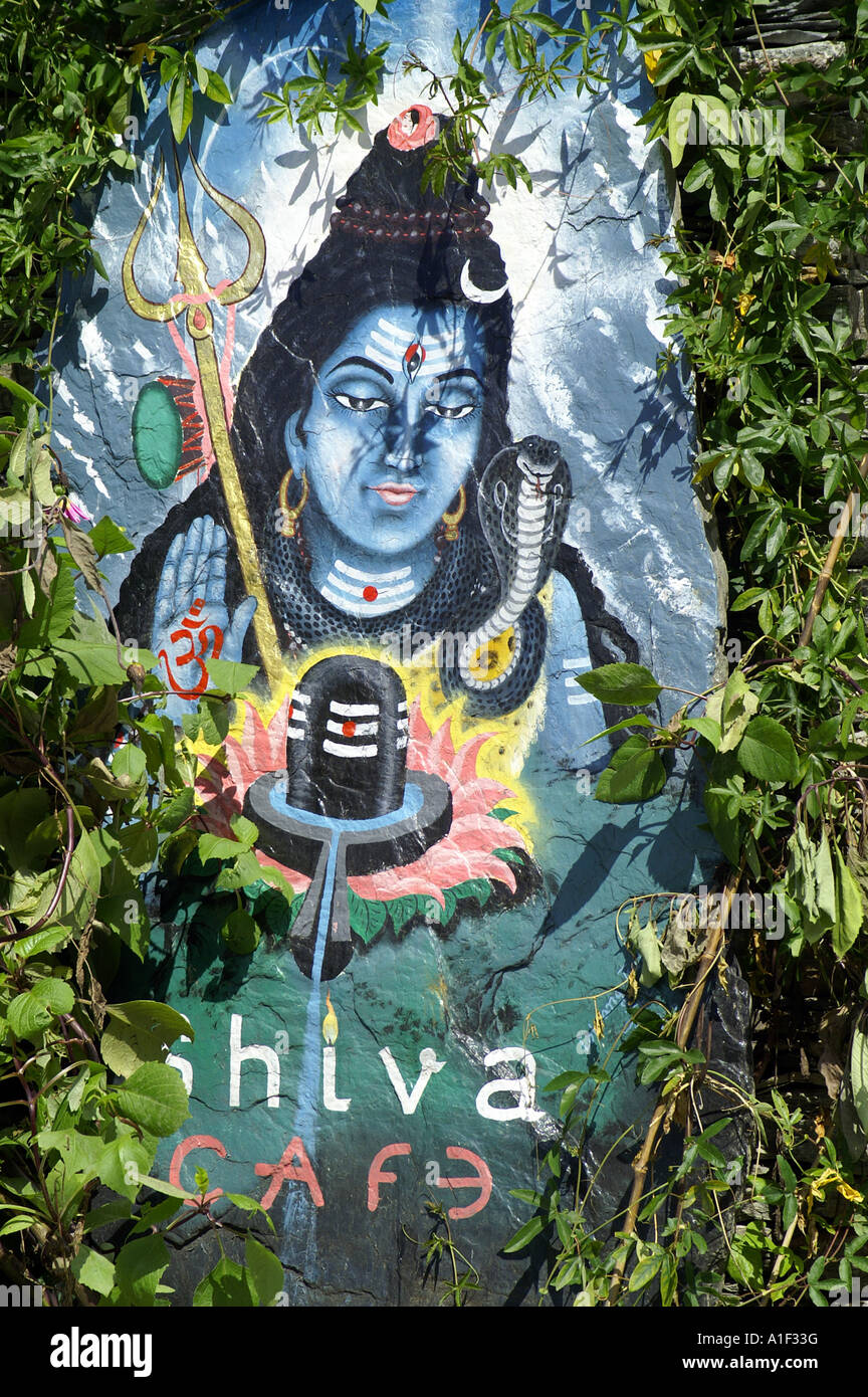 Shiva cafe sign and Shiva the Yogi painting on flat stone Stock Photo