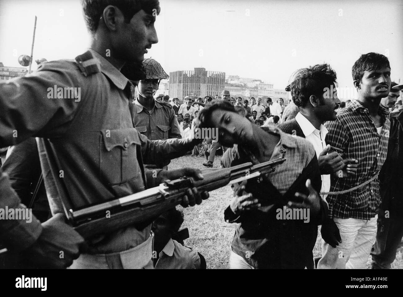 The infamous bayonetting of 5 young men during Bengal s victory rally Dacca Stadium Dec 18 1971 Stock Photo